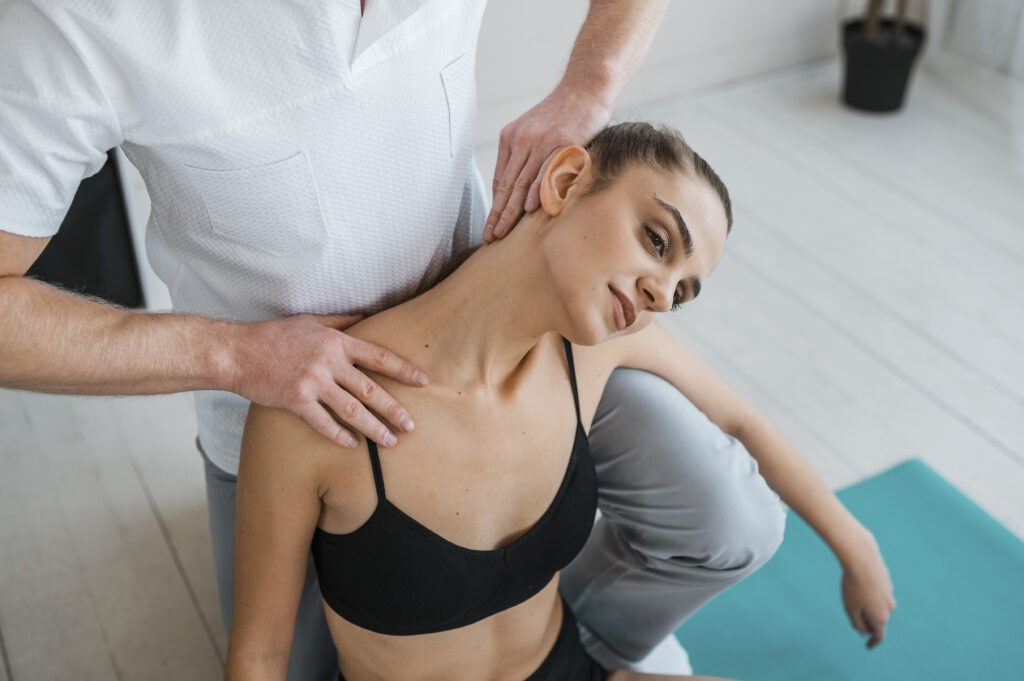 female patient physiotherapy doing exercises with physiotherapist Massage Nacken